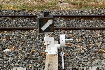 Switch change box and sign on railway track,close up taken