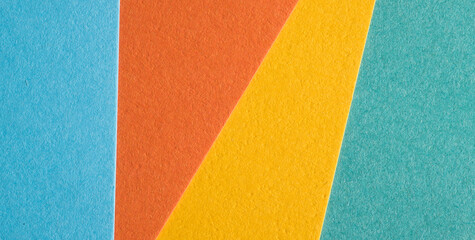 abstract background with multi-colored paper texture close-up for banner background