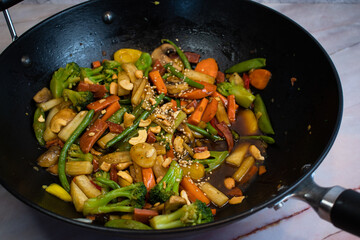 Vegan mixed vegetables stir fry in wok