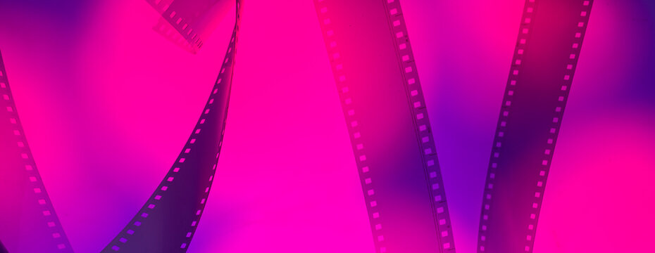 abstract multicolored background with film strip.film festival film production premiere announcement concept