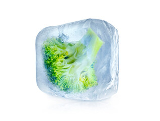 Frozen food. Raw broccoli in ice cube isolated on white