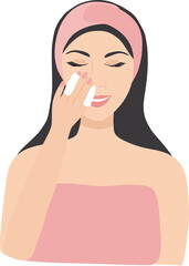 Young woman cleaning makeup on her face. Beauty , skin care and cosmetic concept 