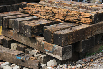 pile of wooden railroad sleepers