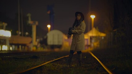 Professional Female Photographer Using DSLR Camera Capturing Photos