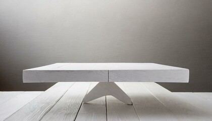 empty room with wooden table.a white wooden table against a white backdrop, meticulously designed to serve as a versatile surface for product displays. Pay attention to the texture and lighting for a 