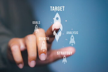 Businessman point rocket icon with target, growth, goal, strategy and analysis