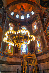 Mosaic of Virgin Mary and Infant Jesus high over the inner sanctum of the Hagia Sophia, landmark...