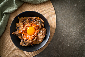 pork bulgogi rice bowl with kimchi and Korean pickled egg