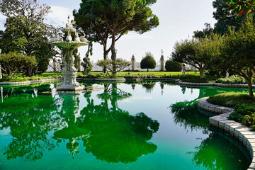 An ornate marble fountain and pool in the grounds of the Dolmabahce Palace in Istanbul, Turkey