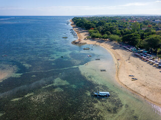 Overhead view of the sheltered tropical beach and coral reef of Sanur, Bali