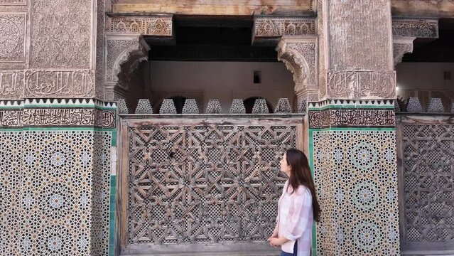 Female solo traveler enjoying the beauty of Bou inania Madrasa which also functioned as a congregational mosque.