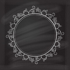 Vector round floral frame with ivy leaves decoration. Vintage style ivy stems wreath on a chalkboard background