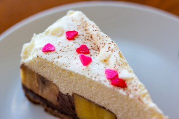 Chocolate Banoffee Pie on white plate.