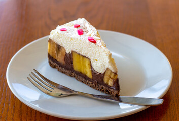 Chocolate Banoffee Pie on white plate.