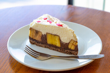 Chocolate Banoffee Pie on white plate.