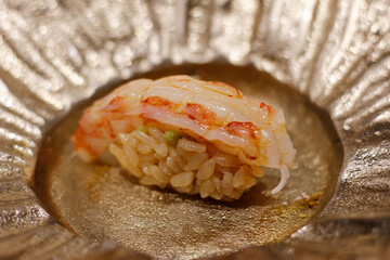 Ama Ebi Sushi on a Japanese style plate with copy space