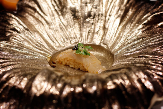 Madai sushi, sushi made from white fish on a Japanese style plate