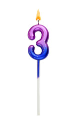 Burning colorful birthday candle isolated on white background. Number 3.	
