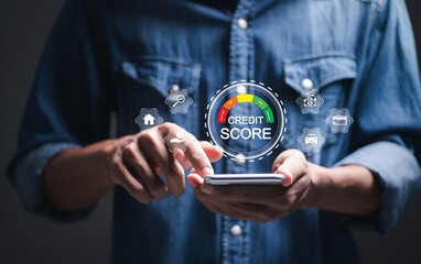 Credit score concept, Person use smartphone with virtual credit score icon for chart with credit...