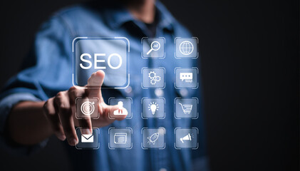 Businessman touch virtual SEO icons to analyze SEO search engine optimization for promoting ranking...