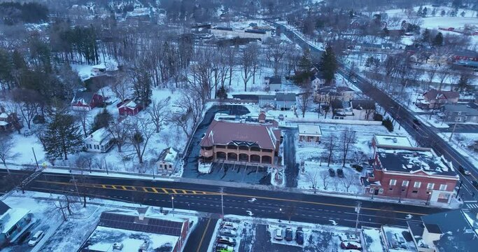 Early evening winter aerial video of the four corners in the Village of Pittsford, New York. (01-14-2024)