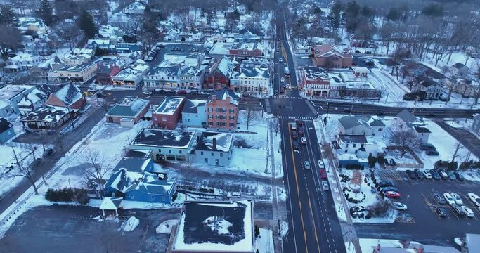 Early evening winter aerial video of the four corners in the Village of Pittsford, New York. (01-14-2024)