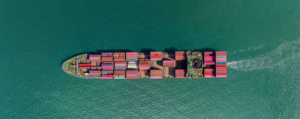 Industrial import-export port prepare to load containers. Aerial top view container ship in export...