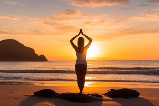 Yoga Practice on the Beach at Sunrise.