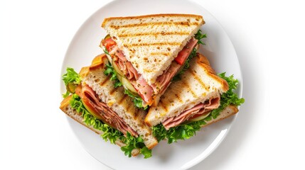 A perfect club sandwich served on a white plate and isolated against a clean white background