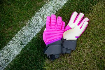 Close up view of bright pink soccer goalie gloves or football keeper gloves. Every goalkeeper needs...