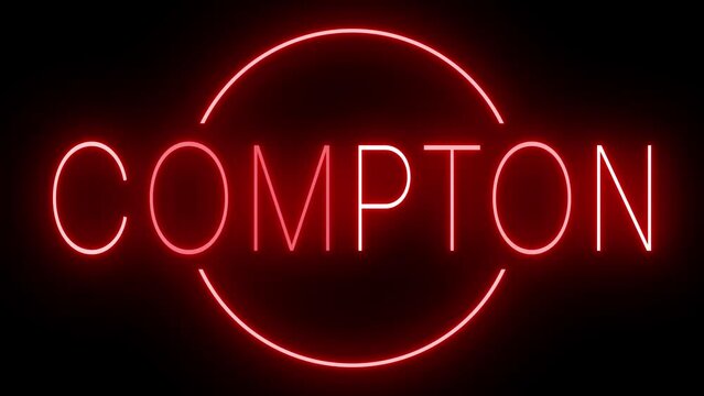 Flickering red retro style neon sign glowing against a black background for COMPTON