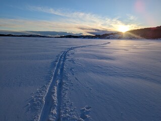 Cross country skiing at frozen lake