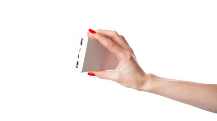 Hands holding white external battery power bank isolated on white background