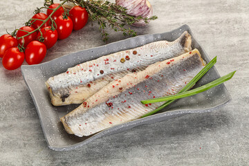 Marinated herring fillet with green onion