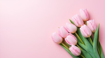 Vibrant Bouquet of colorful tulips. Festive flowers on a light pink background. Easter and mothers day, International Women's Day
