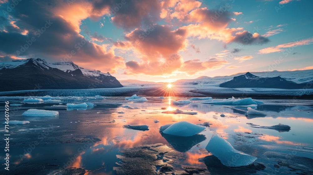 Poster the sun is setting over a body of water with icebergs in the foreground and a mountain range in the 