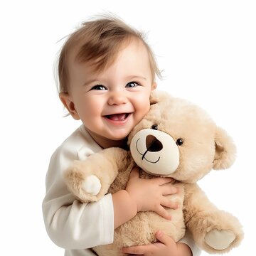 cute little baby toddler hugging teddy bear stuffed toy laughing in joy with on white background