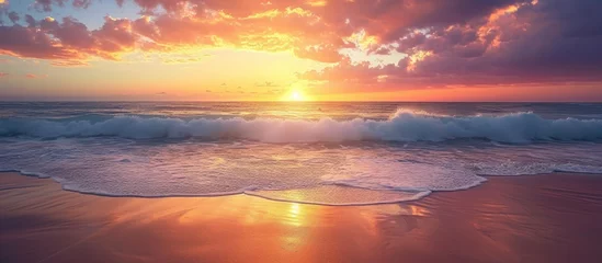Selbstklebende Fototapeten Stunning sunset beach scene with serene waves and captivating sky, perfect for meditation wallpaper. © 2rogan