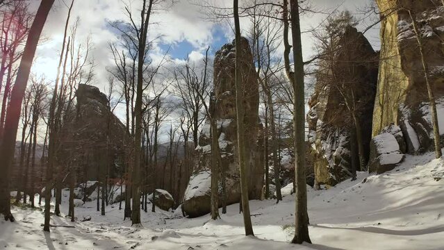ancient cave monastery in the Carpathians in Bubnyshche, Ukraine, which is hundreds of years old, and the Dovbush rocks are millions of years old. Time lapse with clouds that symbolize transience