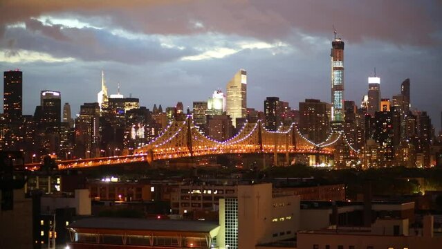 Illuminated Queensboro bridge at night in New York