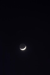 Earthshine is a soft, faint glow on the dark side of the moon. Earthshine occurs when sunlight reflects off the Earth's surface and illuminates the unlit portion of the Moon's surface. 