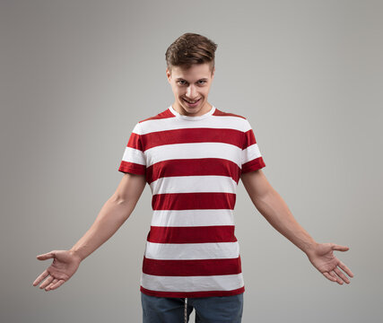 Approachable attitude, open arms, striped casual wear