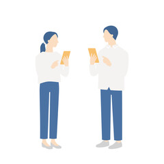 スマホを操作する若い夫婦