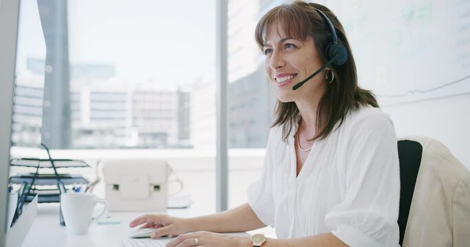 Business woman, call center and computer for communication, e commerce support and helping. Happy consultant, agent or virtual assistant talking on headphones and typing on desktop for FAQ or contact