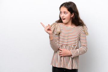 Little girl isolated on white background intending to realizes the solution while lifting a finger up