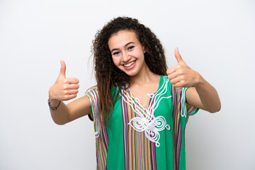 Young Arab woman isolated on white background giving a thumbs up gesture