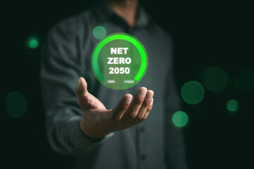 Net Zero 2050 concept. Reducing carbon dioxide (Co2) emissions, Greenhouse effect, global warming. renewable energy, solar energy, wind energy to clean the atmosphere. Energy saving, recycling