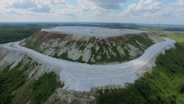 Slope of White Mountain near small river at summer day