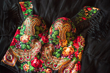 Ethnic embroidered corset, flowers details. Concept of beauty Slavic women, Boho style 