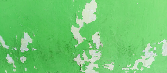 The texture of the old green paint cement wall